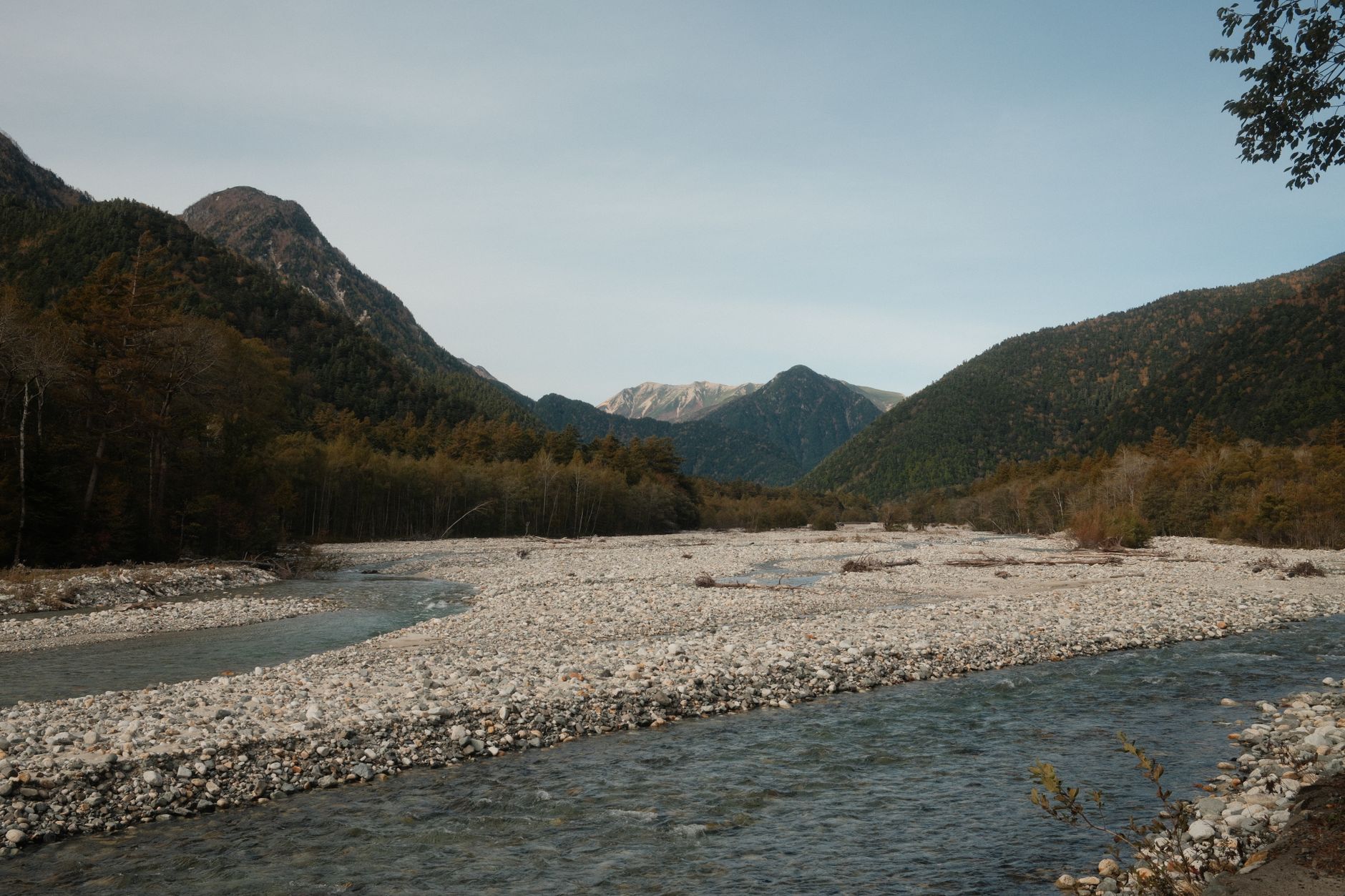 Braided Azusa River and wide gravel bed winding up the Kamikochi valley in autumn