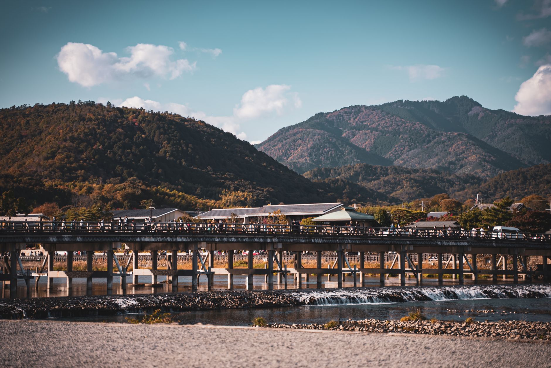 Wooden Togetsukyo Bridge and the forested Arashiyama mountains, Kyoto