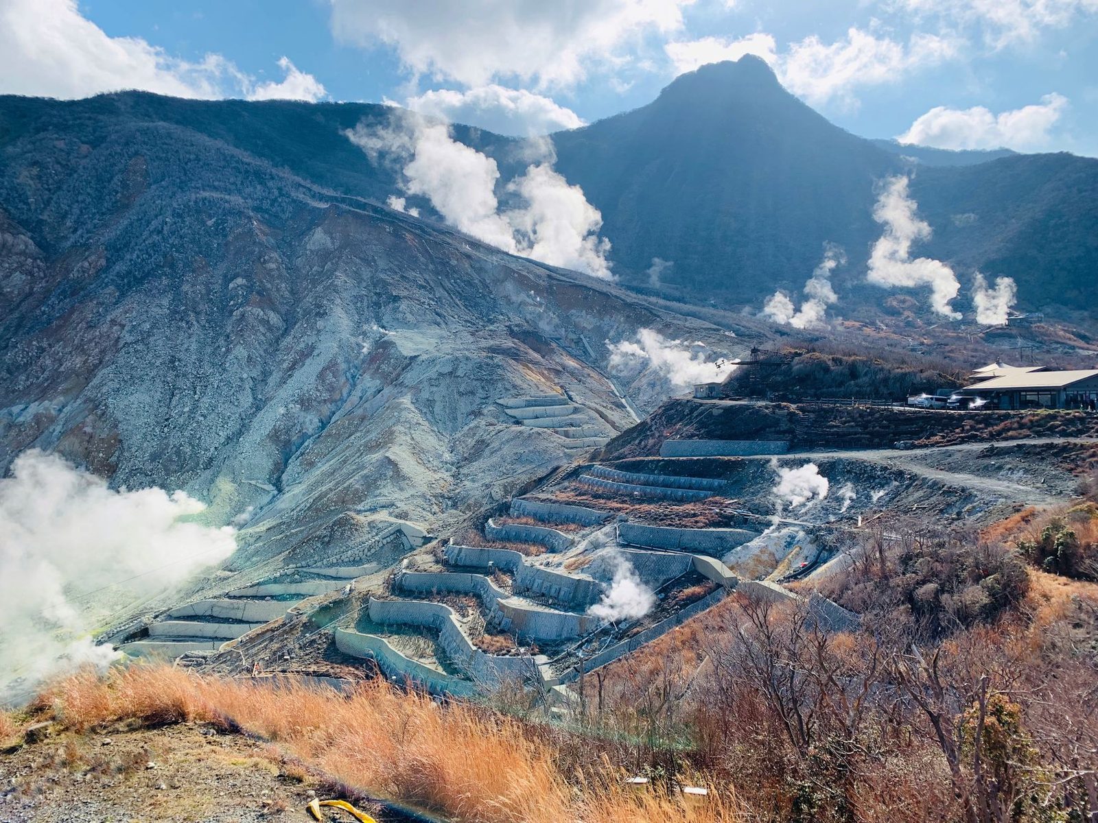 Illustrative photo: Smoking volcanic valley with fumaroles near majestic rough mountains in Hakone Japan