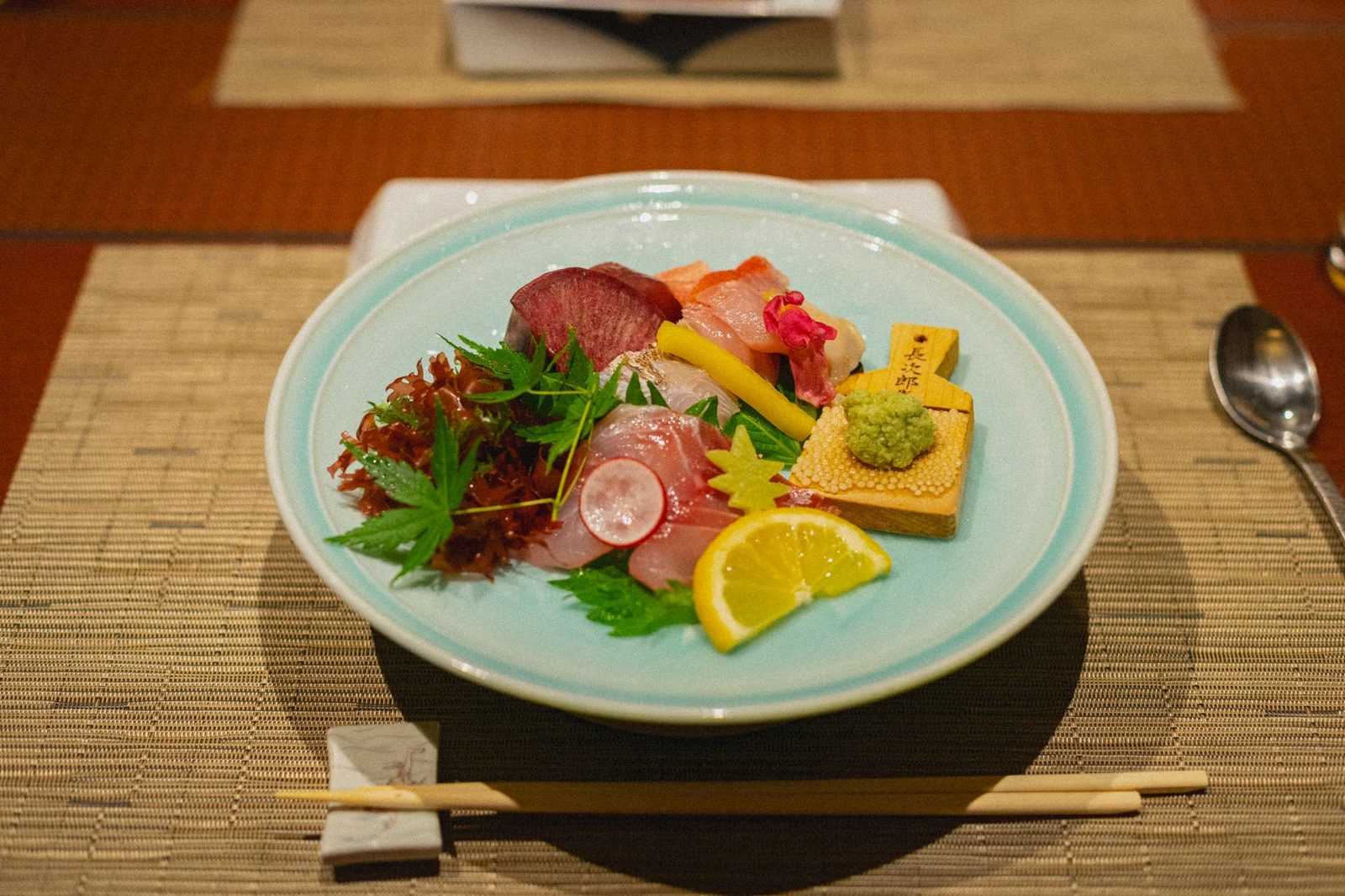 Illustrative photo: A beautifully arranged Japanese sashimi platter featuring fresh fish and vegetables in Kamogawa, Chiba.