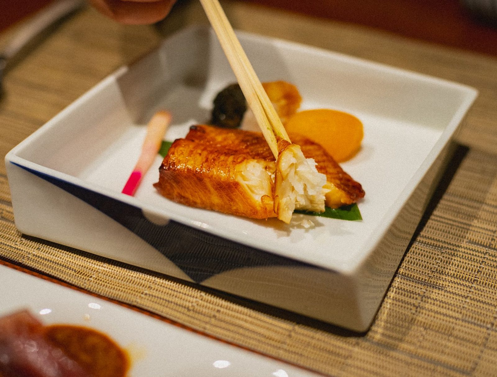 Illustrative photo: Elegant grilled fish dish with chopsticks in a Japanese restaurant in Kamogawa, Chiba.