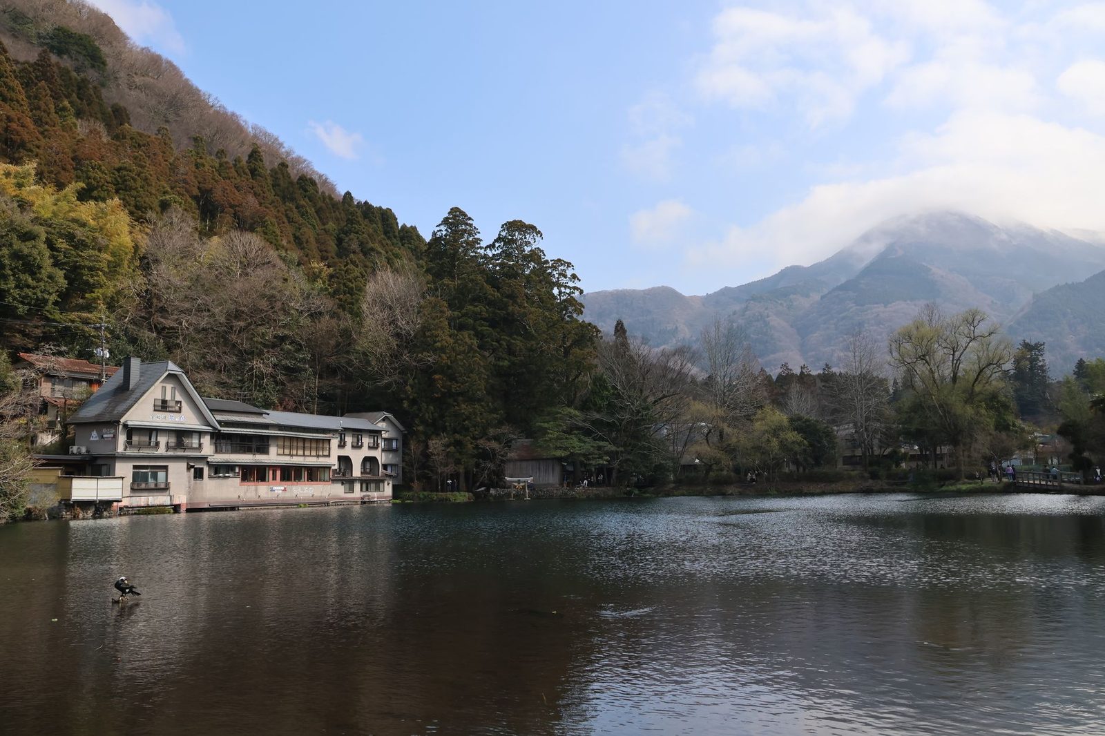 Illustrative photo: Beautiful lakeside view in Yufuin, Japan, showcasing serene natural beauty and architecture.