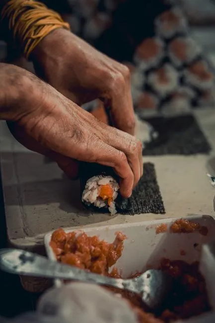 Sushi-making class at a working counter: shape eight pieces, then eat them — 1