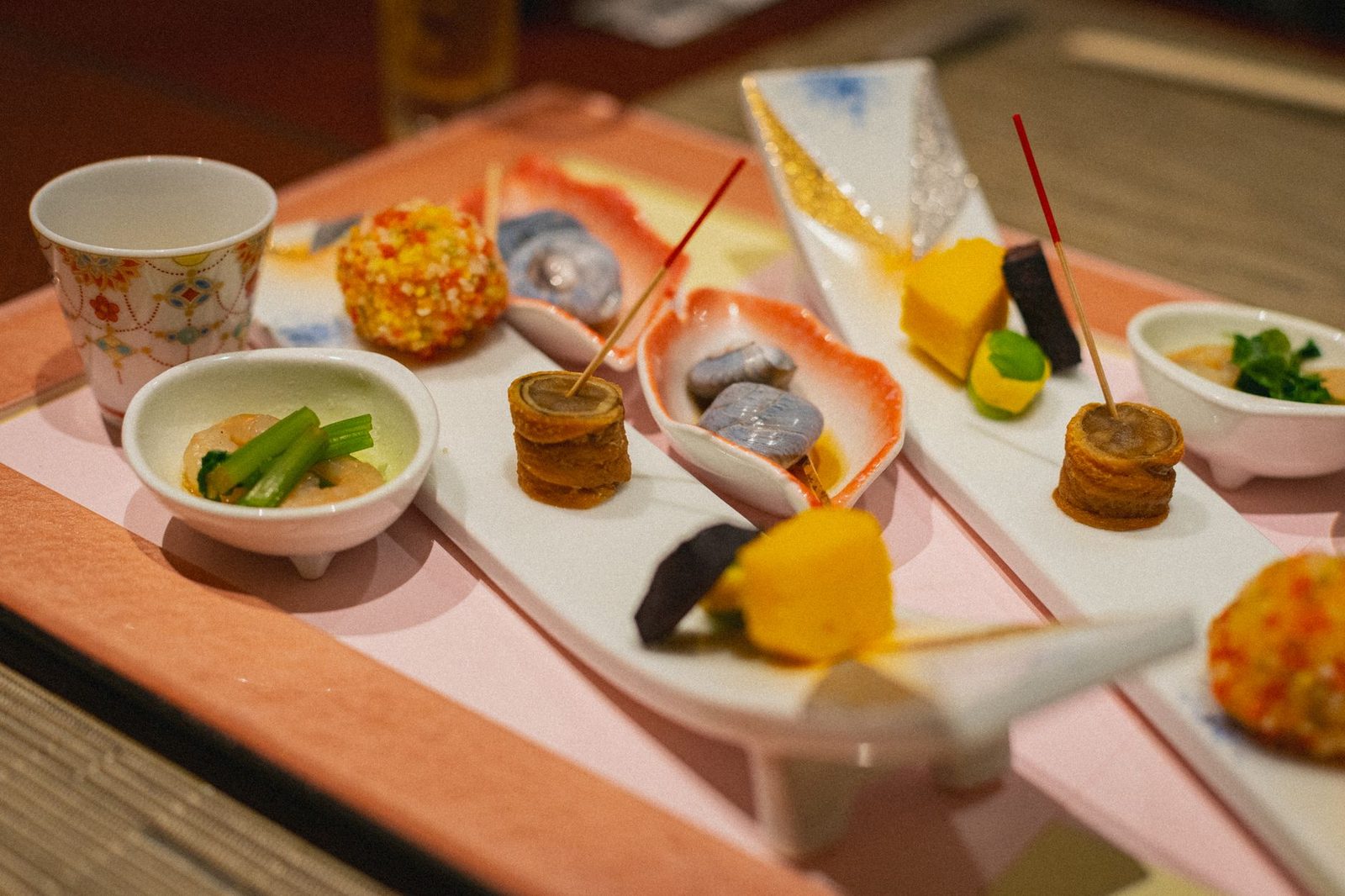Illustrative photo: Exquisite Japanese Kaiseki dishes beautifully arranged, showcasing gourmet culinary artistry in Kamogawa, Chiba.